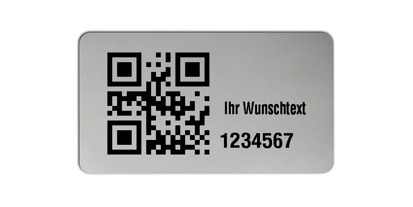 Universaletiketten Material:Folie silber matt Größe:45x25mm Kopfzeile:"Ihr Wunschtext" Barcode:QR Stellenanzahl:7-stellig Ausführung:2 Etiketten pro Nummer Menge:1000